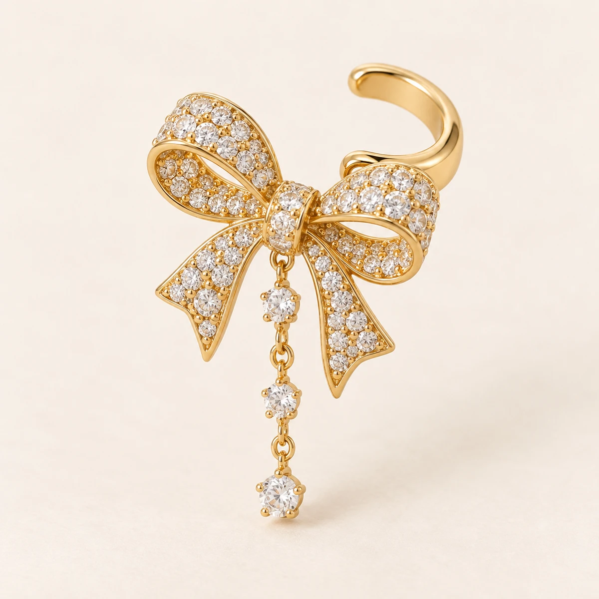 Grand Bow Ear Cuff, Gold, large pavé bow and short dangling chain